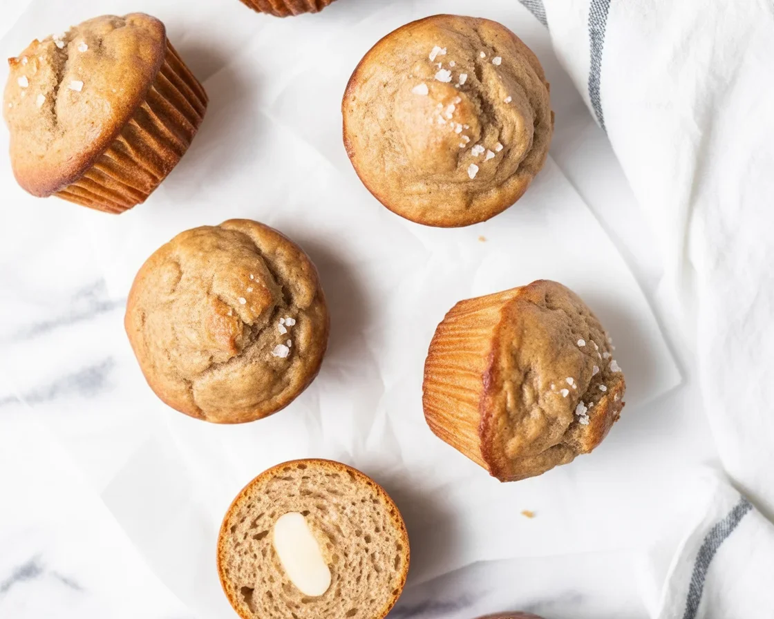 Moist and fluffy Sourdough Discard Muffins with chocolate chips and blueberries.